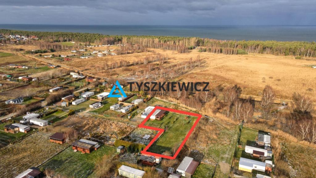 Działka z domkiem holenderskim 650 metrów od morza - zdjęcie 1