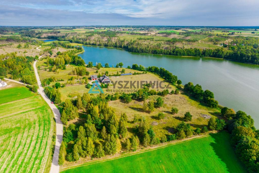 Malownicza działka z linią brzegową jeziora - zdjęcie 4