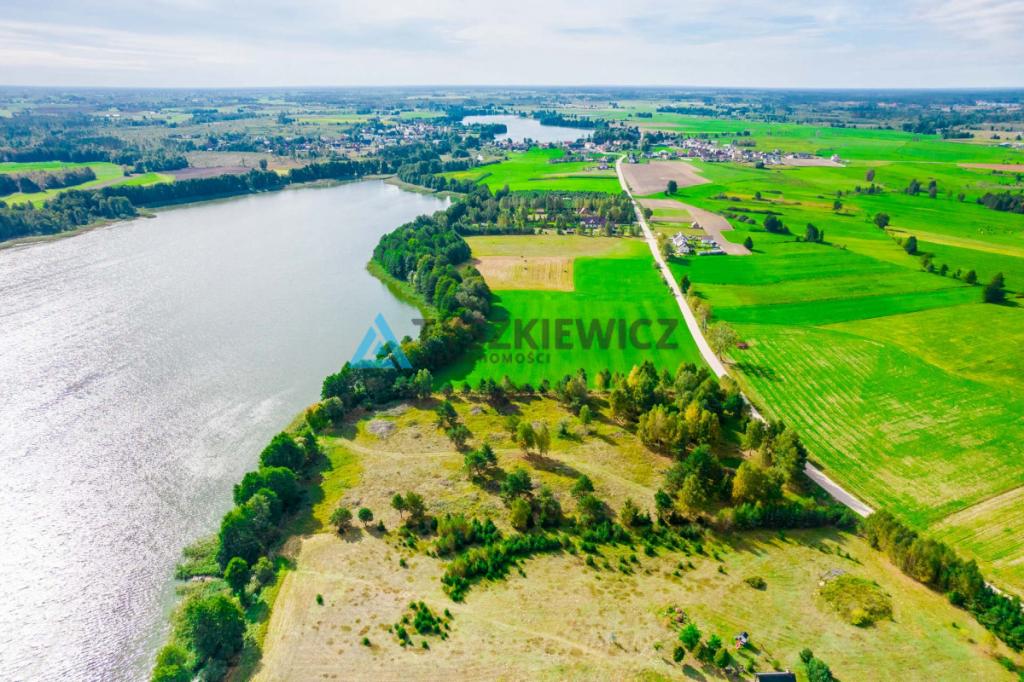Malownicza działka z linią brzegową jeziora - zdjęcie 9