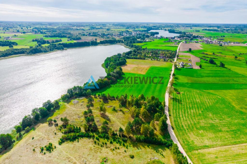 Malownicza działka z linią brzegową jeziora - zdjęcie 10