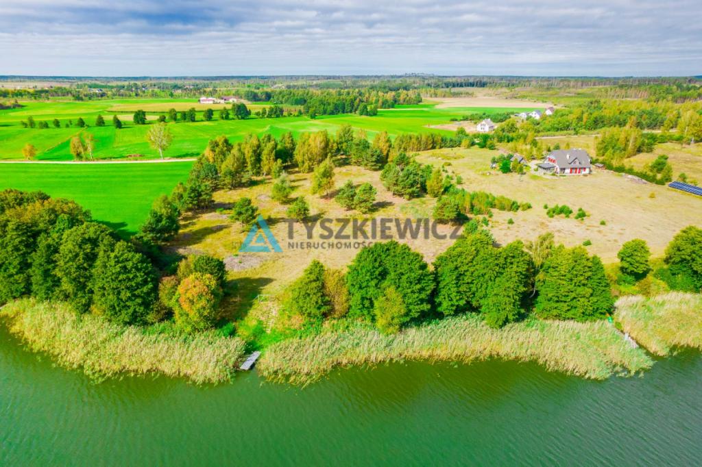 Malownicza działka z linią brzegową jeziora - zdjęcie 7