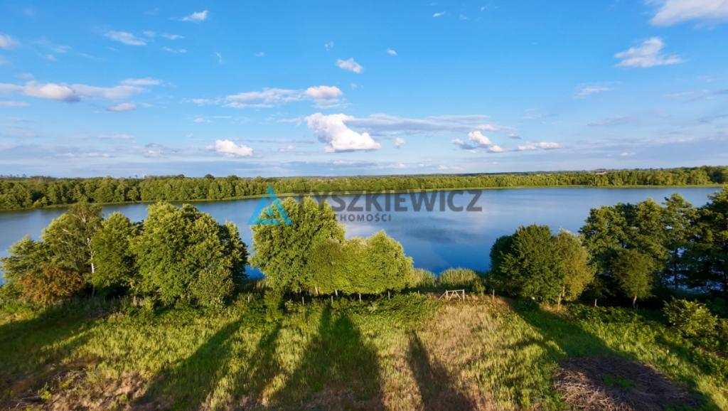 Malownicza działka z linią brzegową jeziora - zdjęcie 26