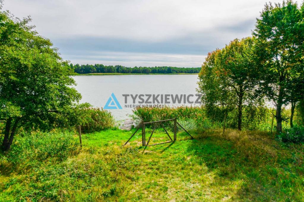 Malownicza działka z linią brzegową jeziora - zdjęcie 13
