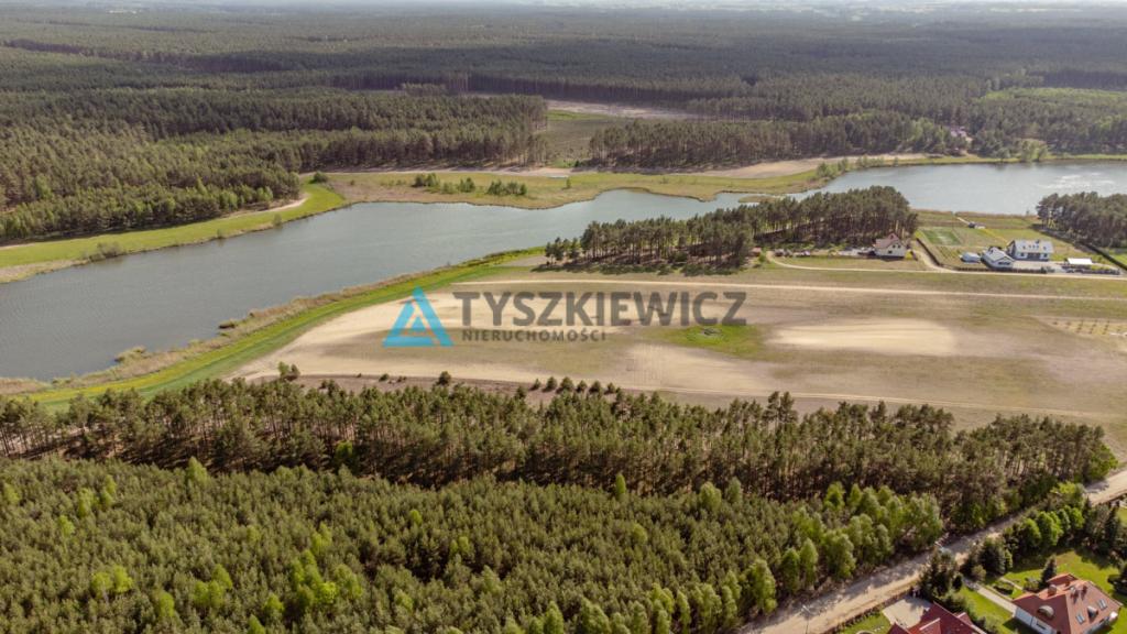 Działka nad jeziorem w otulinie lasu - zdjęcie 4