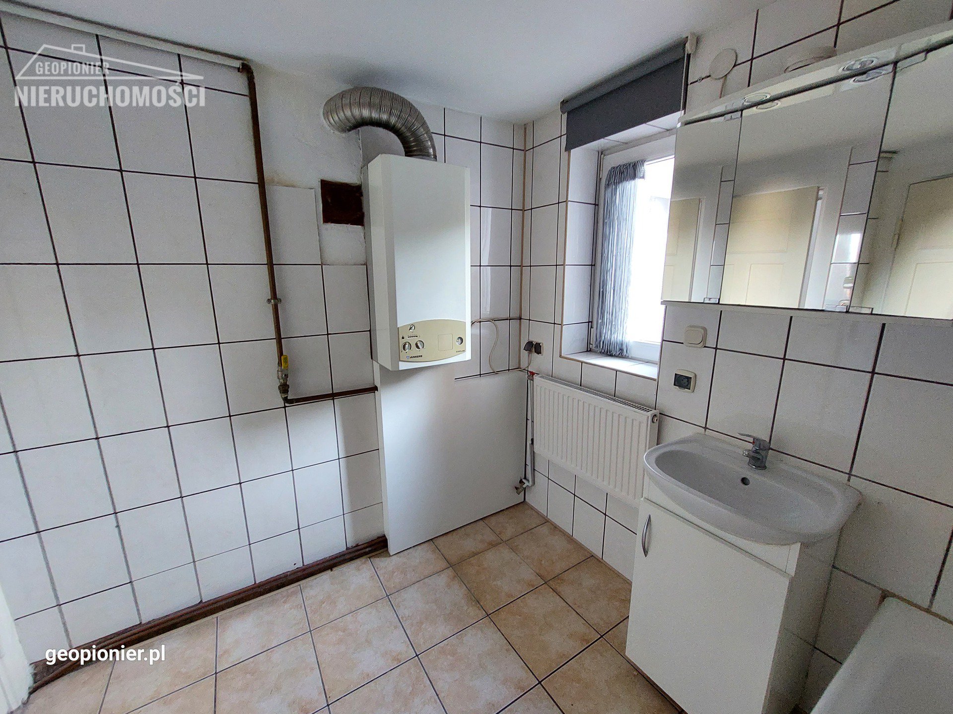 IV-1124 Mieszkanie 3 pokojowe na parterze w Ostródzie przy ulicy 11 Listopada. - zdjęcie 13