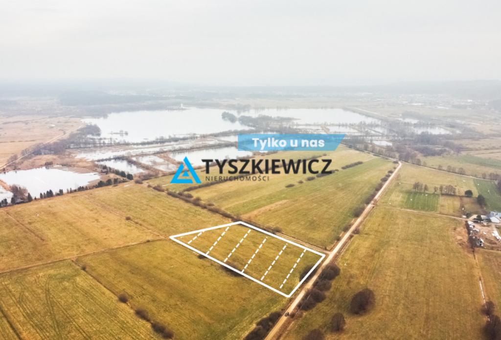 Duża działka rolna w pobliżu jeziora - zdjęcie 1