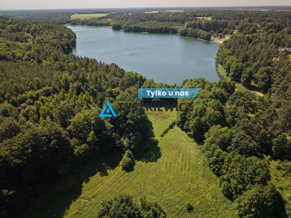 Działka nad jeziorem na sprzedaż - zdjęcie 1