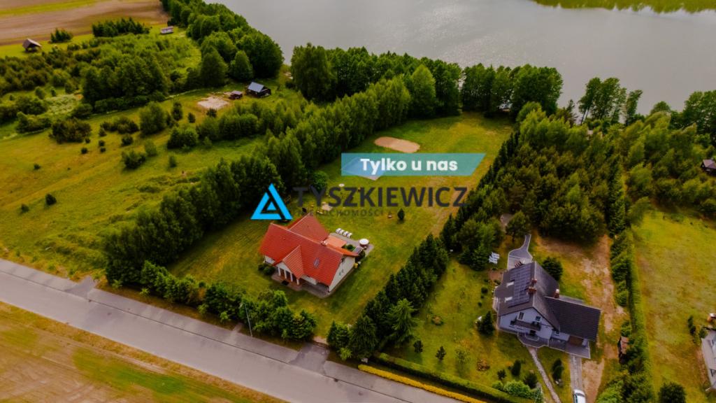 Posiadłość z dużą działką przy linii brzegowej - zdjęcie 1