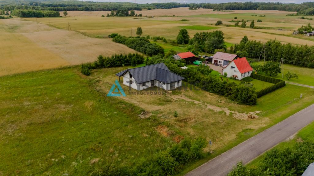 Dom jednorodzinny parterowy z wielospadowym dachem - zdjęcie 6