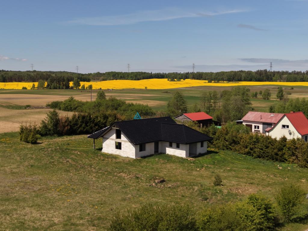 Dom jednorodzinny parterowy z wielospadowym dachem - zdjęcie 24