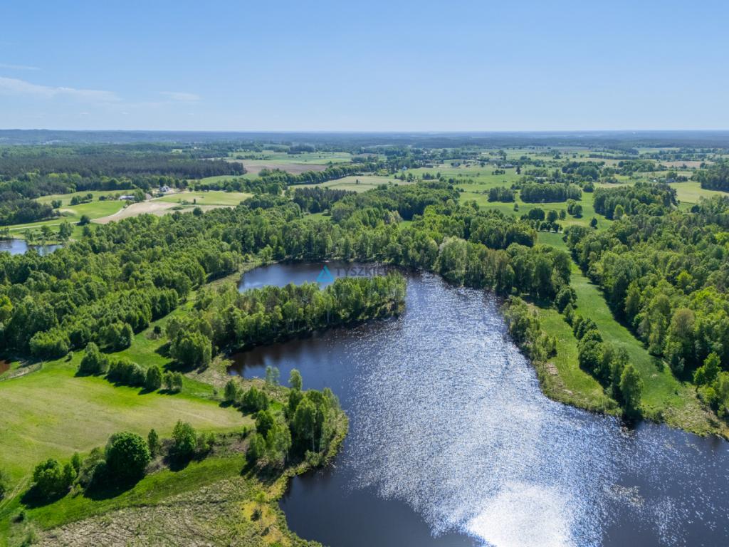 Malownicza działka budowlana z własnym jeziorem - zdjęcie 12