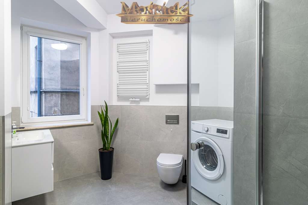 Przestronne mieszkanie w przedwojennej kamienicy - zdjęcie 13