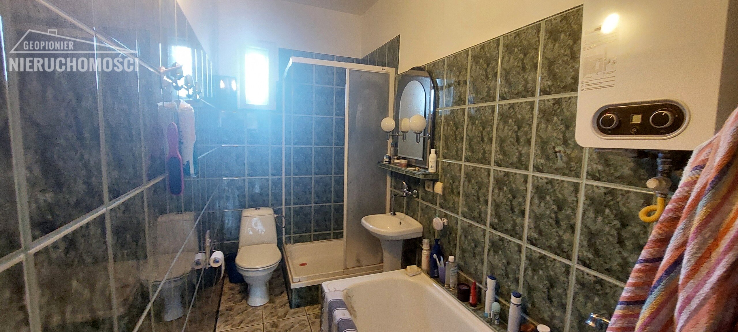 Ostróda - mieszkanie 76,49 m2 + garaż 28,58 m2 + udział w działce - zdjęcie 15