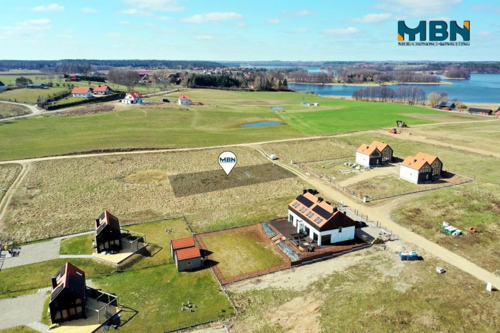 Działka budowlana 1034 m², Ryn - zdjęcie 1
