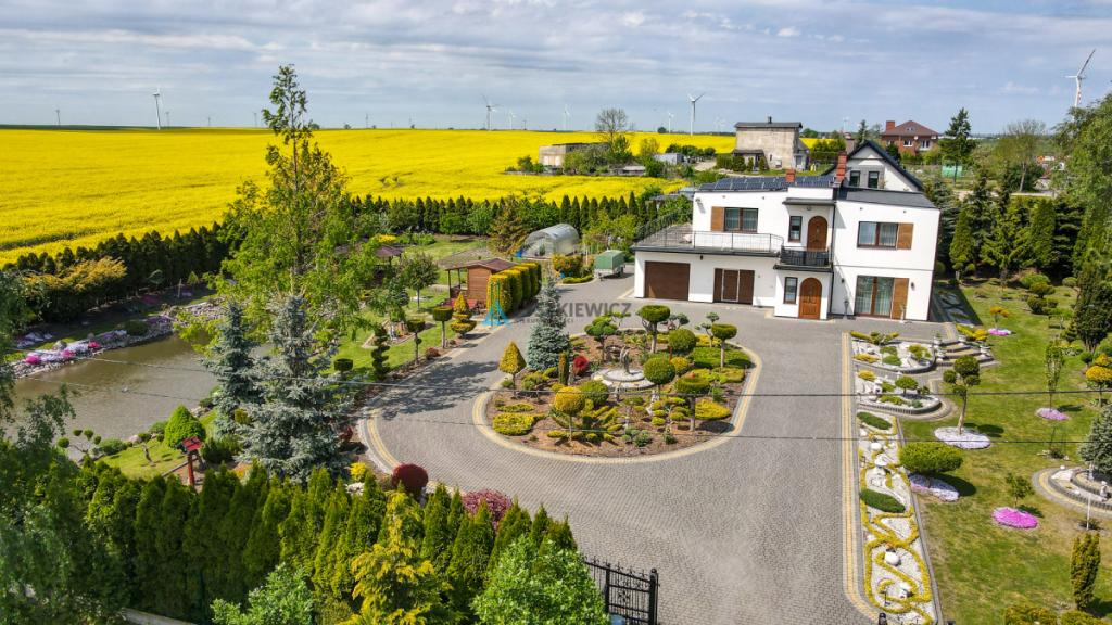Nowoczesny dom z wyjątkowym ogrodem 3600m2 - zdjęcie 19