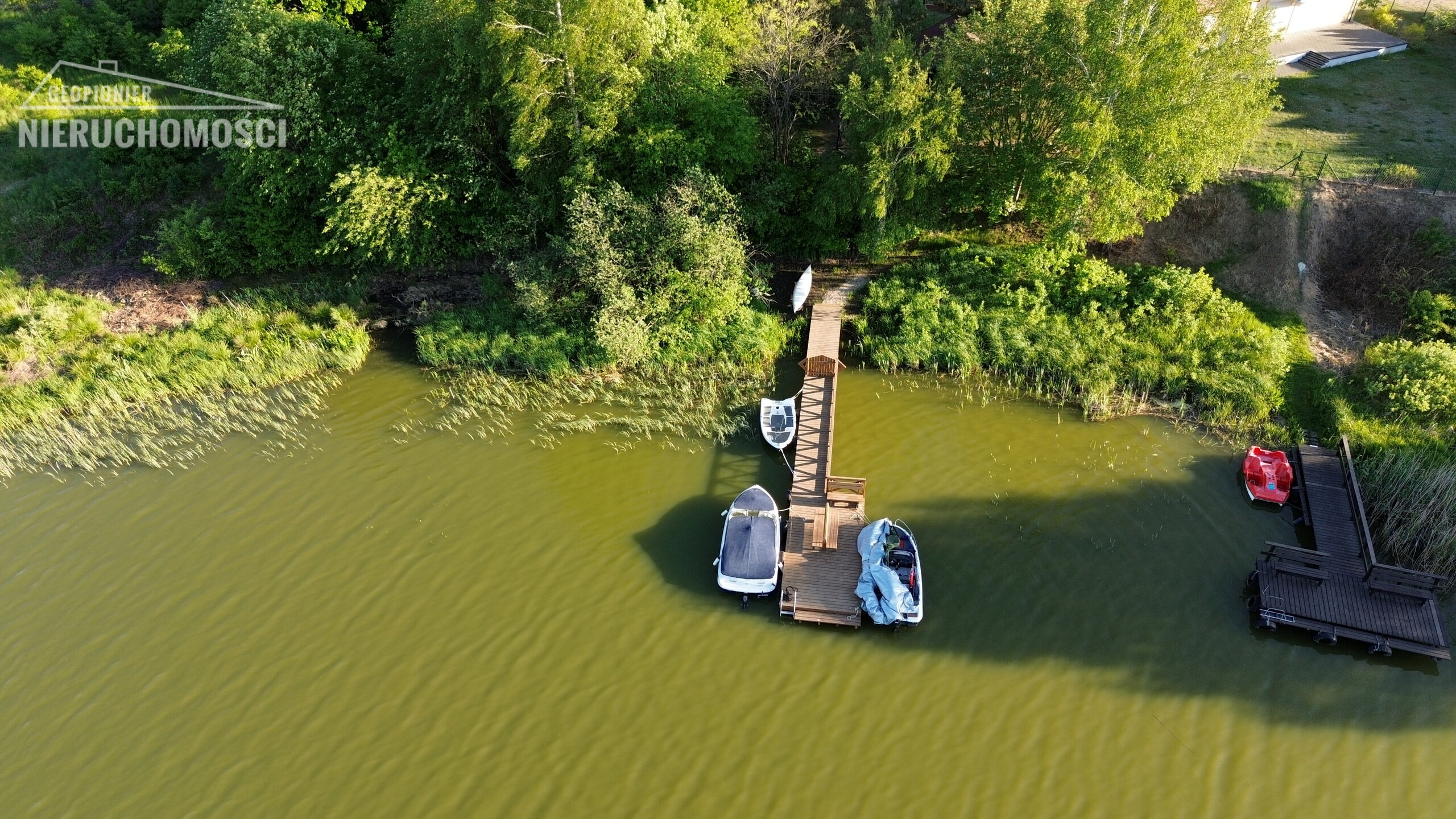 Mazury - Ostróda, dwa budynki mieszkalne nad jeziorem Pauzeńskim, własny pomost - zdjęcie 1