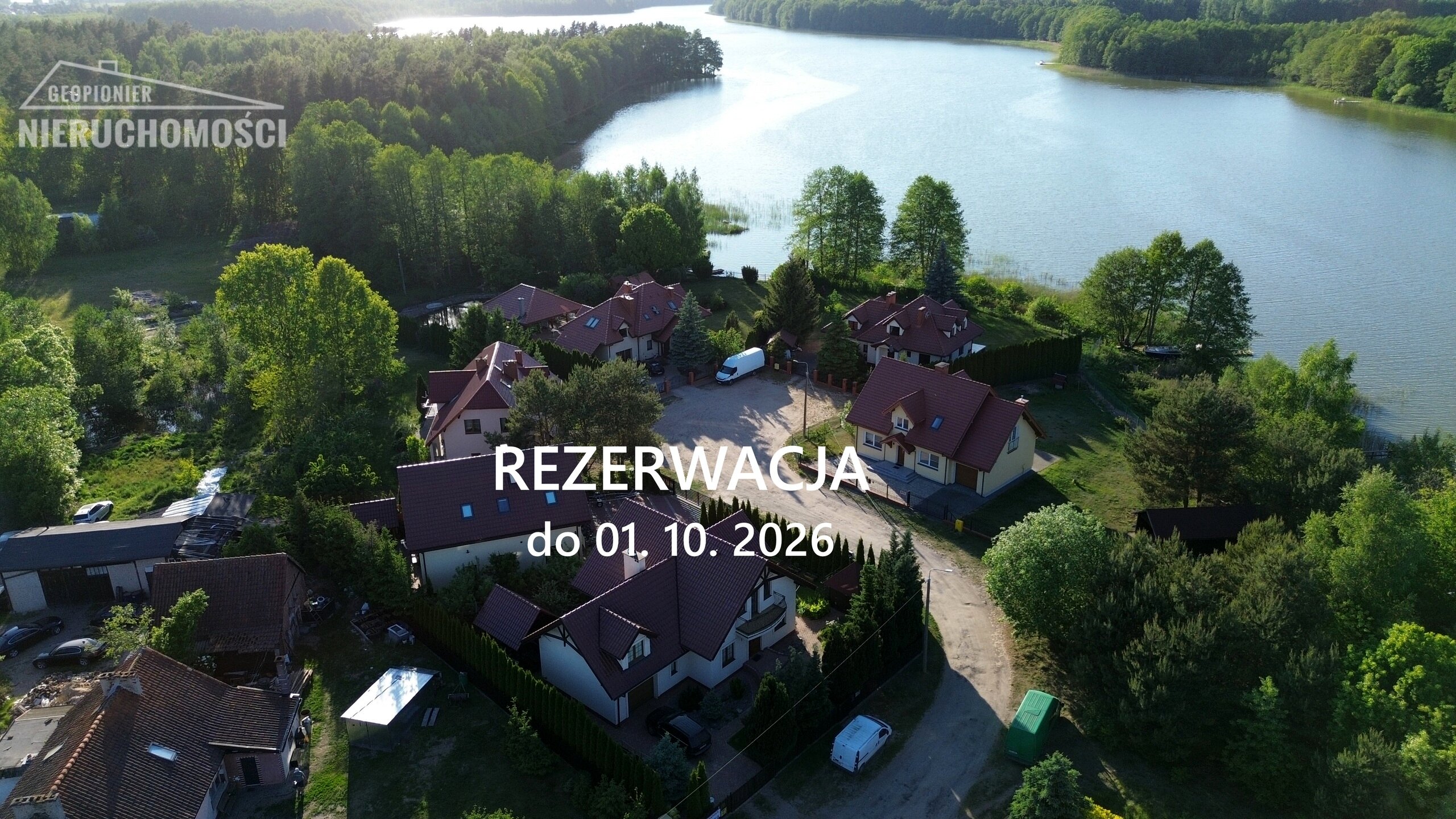 Mazury - Ostróda, dwa budynki mieszkalne nad jeziorem Pauzeńskim, własny pomost - zdjęcie 1