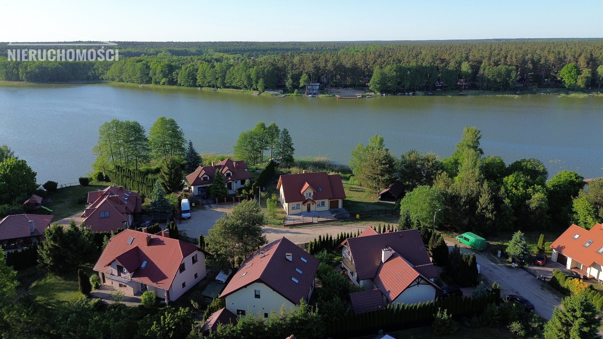 Mazury - Ostróda, dwa budynki mieszkalne nad jeziorem Pauzeńskim, własny pomost - zdjęcie 3
