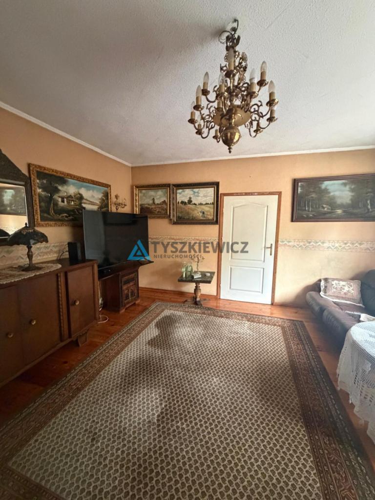 Dom z ogrodem w dobrej lokalizacji - zdjęcie 5