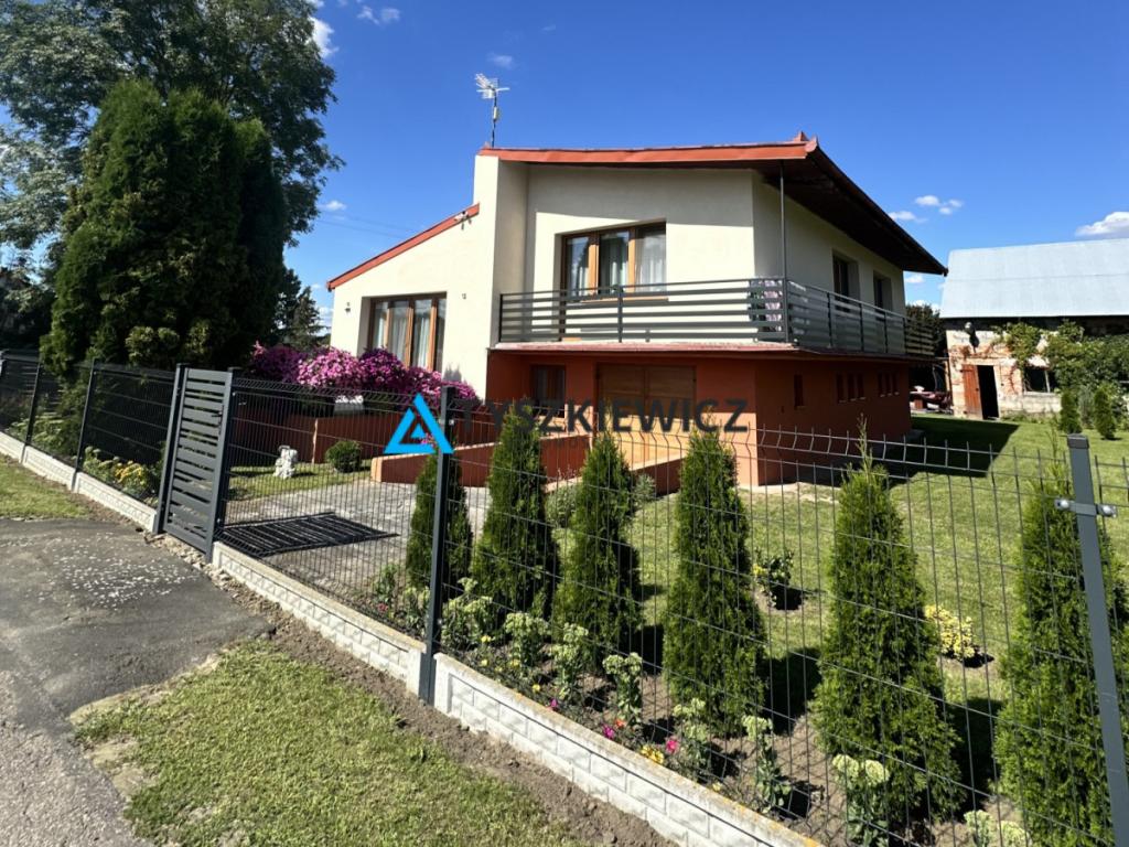 Dom jednorodzinny z ogrodem - komfort i prywatność - zdjęcie 1