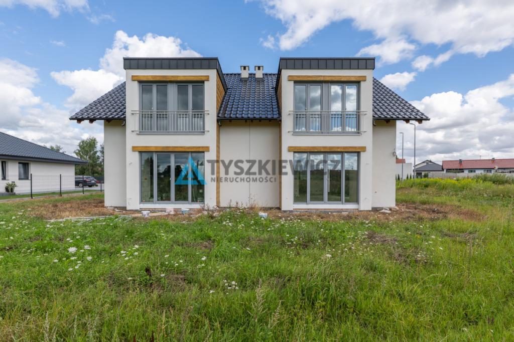 Dom w zabudowie bliźniaczej z ogrodem | garaż - zdjęcie 4