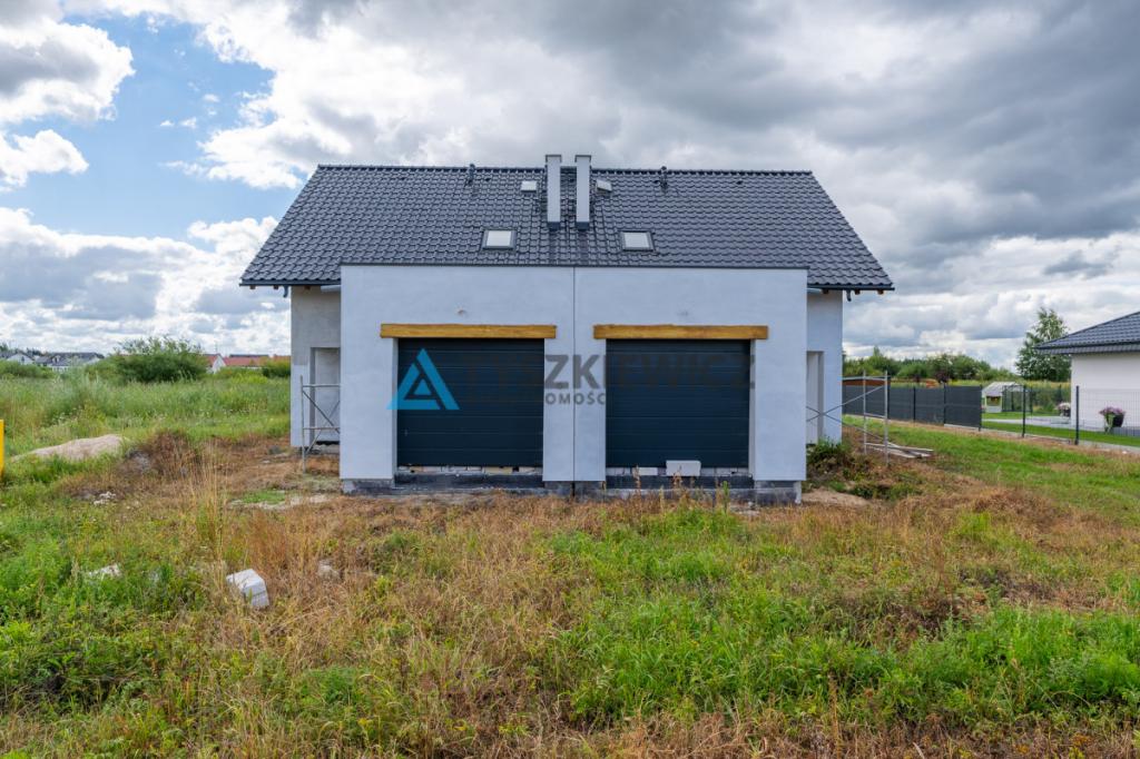 Dom w zabudowie bliźniaczej z ogrodem | garaż - zdjęcie 21