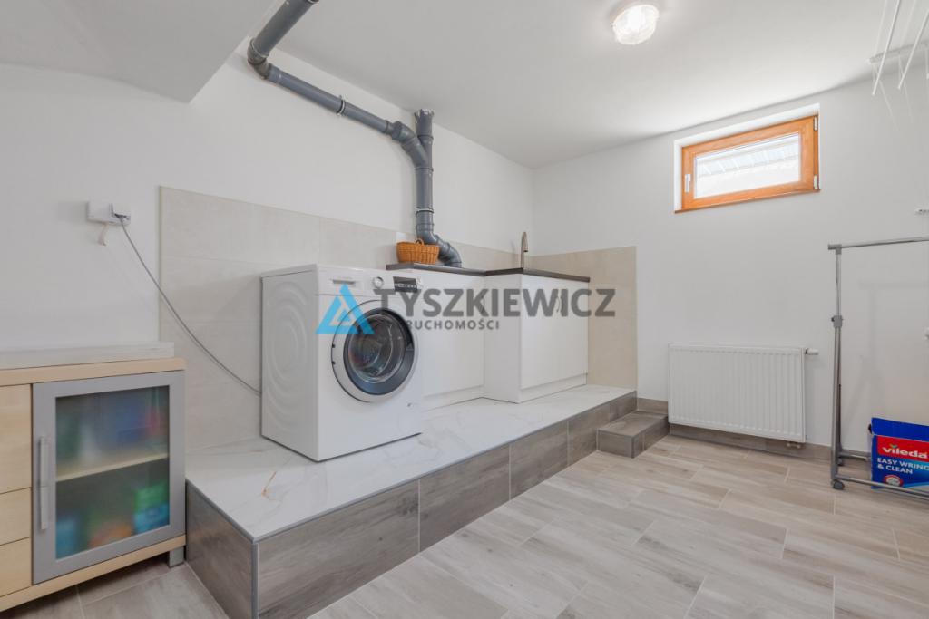 Nowoczesny dom z garażem i ogrodem - zdjęcie 26