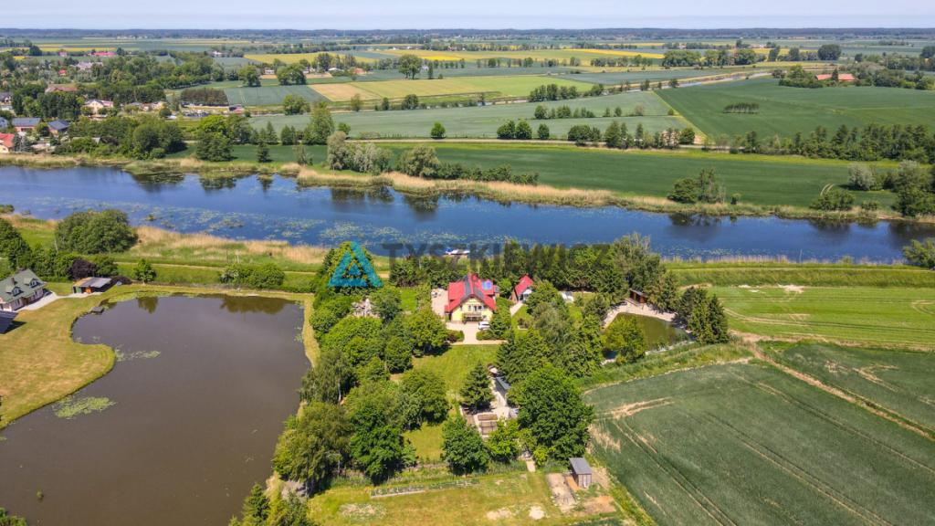 Dom nad rzeką z własną przystanią - zdjęcie 3