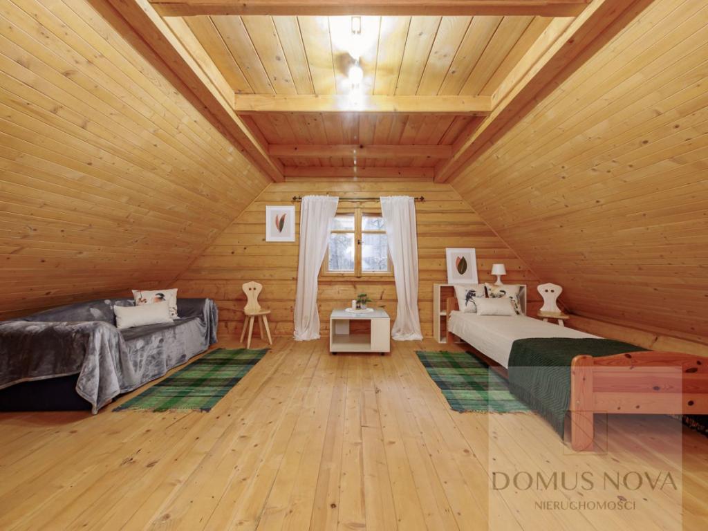 Dom z bala w stylu góralskim - działka 1,5 ha - zdjęcie 15