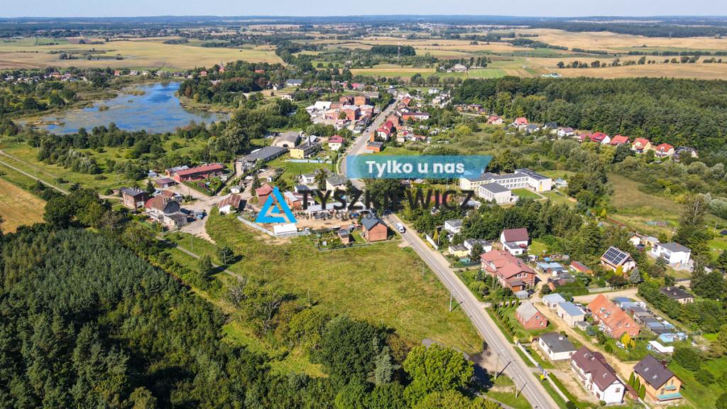 Działka z dużym potencjałem przy drodze asfaltowej - zdjęcie 1